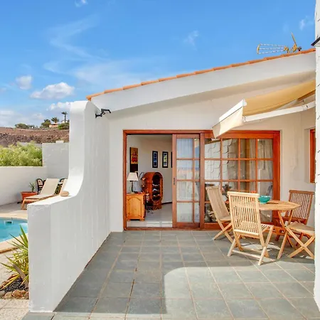 With Pool Overlooking The Atlantic Ocean And *
